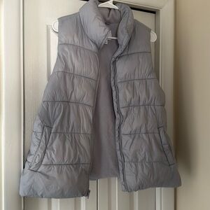 Woman’s size large puffer vest. Size large. Dusty blue color. Warm.